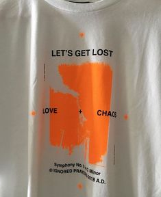 an orange and white t - shirt with the words let's get lost on it