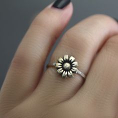 Mammoth Sunflower Ring, Flower Ring, Stack Ring, Silver Stack Ring, Sunflower Stack Ring, Boho Ring, Sterling Silver, Antiqued, Stack Ring This adorable brass and sterling silver sunflower stack ring is one to love! Perfect to wear everyday and if added to other stack rings you can come up with your own unique style too! This is a CUSTOM ORDER There is a processing time for this order. For updates on production times for custom orders please see my shop announcement. Production times vary depend Anniversary Flower Ring With Sunflower Design, Anniversary Sunflower Design Flower Ring, Sunflower Design Rings Suitable For Gifts, Sunflower Design Rings As Gifts, Sunflower Design Flower Ring For Gift, Bohemian Flower Shaped Rings For Gifts, Adjustable Rings With Flower Charm For Gifts, Adjustable Flower Ring For Promise Occasion, Adjustable Flower Charm Rings As Gift