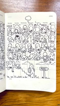 an open notebook with doodles on it and pictures of people around the world in different languages