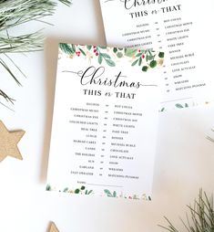 two christmas games on top of each other next to evergreen leaves and star decorations, with the words merry this is that written in black ink