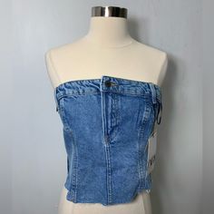 Zara The Jean Top Blue Denim Strapless Top With Zipper Closure On The Side Size Small Armpit To Armpit 16.5 Inch New With Tag #Corsettop #Y2k Style #Festival #Streetstyle #Fashion Blue Denim Sleeveless Tube Top, Denim Blue Strapless Crop Top For Spring, Strapless Denim Blue Crop Top For Spring, Blue Denim Tube Top, Fitted Denim Top With Zipper Closure, Denim Blue Denim Tube Top, Medium Wash Denim Tube Top, Casual Strapless Denim Crop Top, Trendy Denim Tops With Zipper Closure