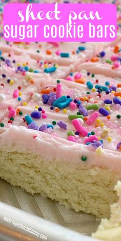 a sheet cake with pink frosting and sprinkles