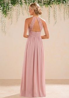 a woman in a long pink dress looking back