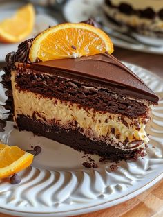 a slice of chocolate cake with orange slices