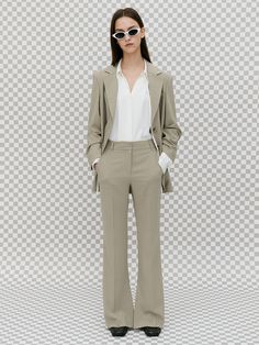 Editor's Notes This slim fit long straight slacks adds a sophisticated mood, creating a slim silhouette with details and long length. Complete the setup coordination with a jacket made in a set like the model.- A deep slit inside the hem- Double closing with buckle and inner button- Practicality with Pockets- Elastic, light polyester materialMeasurements(in.)S / M- Total Length: 40.94 in. / 41.34 in. - Crotch 9.84 in. / 10.24 in. - Waist: 27.95 in. / 29.92 in.Model info: Height 5' 58 / 30.5-23-34.5 / Foot KR 240mm(US 7) (Fitting size S)Composition & Care- Shell: 95% Polyester, 5% Polyurethane- Make sure to dry clean the oil separately.- Steam to low temperature.Designer- by LINE STUDIO ONE Long Length, Duster Coat, Steam, Trousers, Slim Fit, Buckle, Elastic, Clothes For Women, Pants