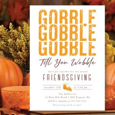 an orange and white thanksgiving card with pumpkins in the background