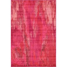 a pink and red rug with an abstract design on the bottom, it is very soft