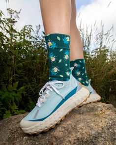 Brighten up each step with our Forest Glow socks - where the magic of a summer night comes alive at your feet. These socks capture the enchanting dance of fireflies in an all-over pattern that brings a touch of wilderness wonder to your everyday adventures. Cozy Essentials, Camp Socks, Everyday Adventures, Summer Night, Summer Nights, Unisex Design, Outdoors Adventure, The Magic, Organic Cotton