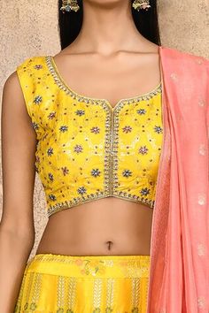 Yellow brocade silk lehenga with an attached cancan and floral pattern. Comes with a padded blouse and a pink dupatta. - Aza Fashions Silk Lehenga With Pallu, Sleeveless Lehenga With Cutdana For Festivals, Bollywood Lehenga With Motifs, Designer Yellow Sets With Motifs, Resham Embroidery Lehenga Sleeveless, Yellow Sleeveless Choli With Pallu, Semi-stitched Sharara With Motifs, Fitted Sleeveless Anarkali Set For Festivals, Chanderi Choli With Dori Work