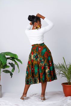 Product Detail Flare Skirt with Pockets Lined: No Pocket: Yes Predominant Colour Green Item Type: Africa Clothing Material: 100% African Print Ankara Cotton Model wearing Size M CARE INSTRUCTION Not suitable for Machine wash Do not Tumble dry Do not wring Hand wash only Cold water only Press with cool iron Iron inside out HEALTH & SAFETY Keep packaging away from young children and infants (Plastics and or Boxes) Shop our new collection of African Print Ankara Midi Skirts. Handmade in high-qualit Ankara Skirts Designs, Kitenge Designs For Young Ladies, Chitenje Styles, Dresses Traditional African, Ankara Flare Skirt, Ankara Midi Skirt, African Skirt Outfit, African Print Midi Skirt, Dresses Ankara