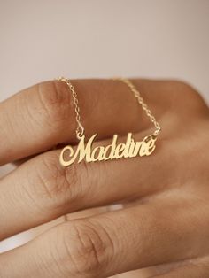 Imagine a necklace that holds a special place in your heart. Our personalized 14k gold name necklace offers a unique and meaningful way to express your love and affection. This exquisite piece, adorned with your chosen name, is a testament to the bond you share with a loved one. Whether it's a gift for your wife or a cherished keepsake for yourself, this personalized necklace is a symbol of enduring love and connection. Features and Benefits ✅ Customizable with your desired name ✅ Crafted from h Name Crafts, Anniversary Necklace, Necklace Name, Gold Name Necklace, Valentines Day Presents, Enduring Love, Love And Connection, Jewelry Personalized, Love And Affection