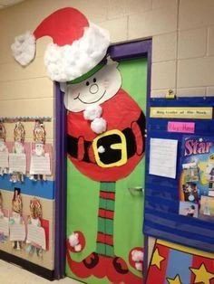 a classroom door decorated for christmas with santa clause