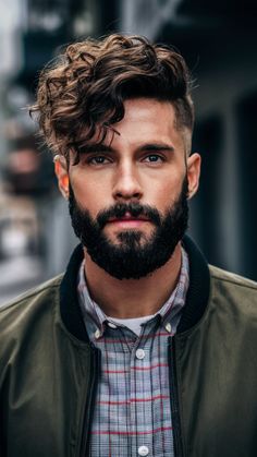 Explore rugged curly hairstyles for men with beards. Great for a bold and masculine appearance! Save this pin for curly hair styles with beards!
#CurlyHair #MenHairstyles #RuggedLooks Hairstyles For Men With Beards, Men With Beards