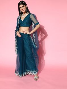 Teal Net Saree with Blouse Piece - Inddus.com Designer Net Pre-draped Saree With Unstitched Blouse, Party Net Pre-draped Saree, Designer Pre-draped Net Saree, Elegant Pre-draped Saree With Unstitched Blouse In Net, Festive Fitted Sheer Sets, Blue Net Saree, Blue Sharara, Maroon Lehenga, Ruffle Pattern