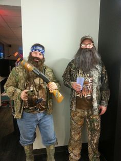 two men dressed up in duck hunting gear