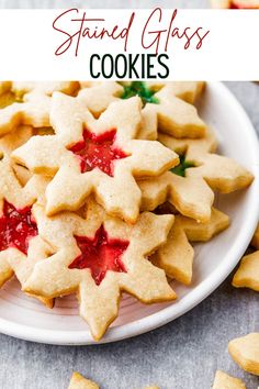 star shaped cookies on a white plate with text overlay that reads, stained glass cookies