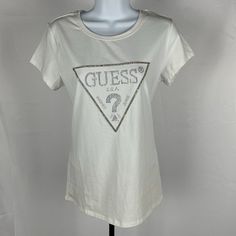 Guess Jeans Embellished Logo Tee White Casual Embellished T-shirt, Embellished Graphic Tee With Crew Neck, Embellished Cotton T-shirt For Spring, Spring Embellished Cotton T-shirt, Casual Embellished T-shirt For Spring, White Embellished Crew Neck Top, White Embellished Cotton Tops, Jeans Embellished, Guess Shirt