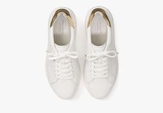 we call these our lift sneakers for a reason: the platform midsoles will add a little bit of height plus the supple nappa leather with pops of print and color will instantly elevate any outfit you pair them with. | Kate Spade Lift Sneakers, Optic White/Pale Gold - 9 Kate Spade Lace-up Sneakers With Branded Insole, Kate Spade White Low-top Sneakers, Kate Spade Casual Low-top Sneakers, Kate Spade White Sneakers For Spring, White Kate Spade Sneakers For Spring, Kate Spade Casual Sneakers For Spring, Kate Spade Casual Spring Sneakers, Pale Gold, For A Reason