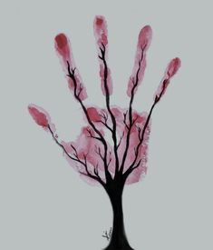 a tree with pink leaves is shown in the shape of a handprint on a white background