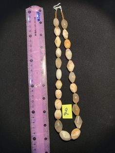 A beautiful string of Bended white agate natural found from Afghanistan dating 1800 yrs. They are found at that time in Afghanistan mostly but also some found in India and Pakistan too. They were used as a special charm jewellery by the affluents at that time period. Beautiful counter bronze are decorated further in between the beads. India And Pakistan, White Agate, Time Period, Charm Jewelry, Pakistan, Agate, Period, Thailand, Convenience Store Products