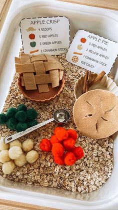 an apple crisp tray is filled with apples, oats, and other food items