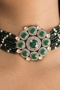 I Jewels 18k Gold Plated Traditional Green Stone Studded & Beaded Choker Necklace Jewellery Set For Women/Girls Graceful and flawless: Give yourself that beautiful look and make others jealous with our traditional necklace set. It has a high quality imitation Green stone kundan along with unique Gold Plated look-alike which gives it an edge over other earrings. This is a one of a kind design which will go with all types of dresses Product Features: Color: Green Material: Alloy Necklace Size: Len Round Beaded Temple Jewelry, Festive Round Beads Choker For Gift, Bollywood Style Beaded Jewelry For Gift, Festive Beaded Choker Necklace, Beaded Kundan Choker Necklace For Gift, Festive Round Beaded Jewelry, Kundan Beaded Choker Necklace, Bollywood Style Necklace With Hand Set Round Beads, Festive Faceted Beads Jewelry As Gift