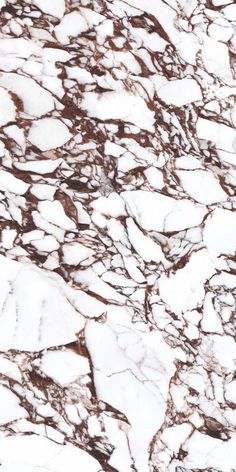 an image of marble that looks like it has snow on the ground and is brown and white