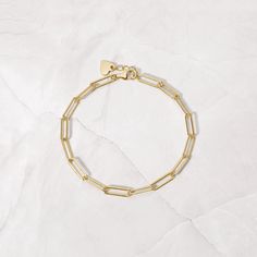 "Beautiful and delicate paperclip bracelet featuring a textured design. Great for stacking or for a minimalist look! - - - D E T A I L S - - - * Made of 925 Sterling Silver * THICK, durable plating of 14k Gold or Rhodium - for a piece that will be with you for years to come! * Nickel-free & Hypoallergenic  * Available in 6.25\" or 6.75\" Lengths  * Lobster Clasp Closure  * Width: 3.5mm Bezel Bracelet  https://www.etsy.com/listing/1344597339/bezel-diamond-bracelet-dainty-bracelet?click_key=becead1c989ee745019e12294a2fd1b44bd22392%3A1344597339&click_sum=d20208e7&ga_search_query=bracelet&ref=shop_items_search_46&pro=1&sts=1 Textured Chain Bracelet Made with 100% Pure Love ♡ Happy to answer any questions you may have! 🥰 Let's Connect! 🥰 IG: samijewels_" Gold Arm Band, Paperclip Bracelet, Bezel Bracelet, Dainty Gold Bracelet, Bridesmaid Gifts Jewelry, Gold Armband, Dainty Bracelet, Bracelet Dainty, Bracelet Chain