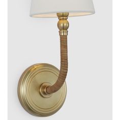 a wall light with a white shade on the top and bottom part of it's arm