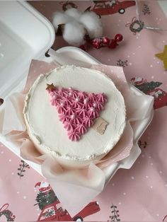 a heart shaped cake sitting on top of a table