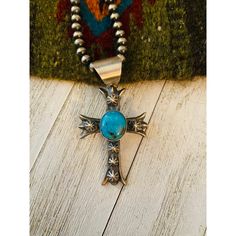 New Without Tags * Ethnic Regional Style : Native American * Shape : Cross * Metal : Sterling Silver * Jewelry Type : Pendants * Type : Pendant * Style : Pendant * Tribal Affiliation : Navajo * Country Of Origin : United States * Handmade : Yes Gorgeous Navajo Sterling Silver Turquoise Cross Pendant. This Pendant Measures 3 Inches Long And 1 3/4 Inches Wide. Bale Measures 1/2 Of An Inch Across. Signed By The Artist Chimney Butte And Stamped Sterling. Pendant Only. Please Contact Us With Any Ques Bohemian Turquoise Cross Jewelry, Southwestern Turquoise Necklace With Oxidized Finish, Traditional Turquoise Concho Necklace, Traditional Turquoise Necklace With Concho, Turquoise Concho Bohemian Necklace, Turquoise Bohemian Concho Necklace, Southwestern Turquoise Necklace For Festivals, Southwestern Style Turquoise Necklace For Festivals, Bohemian Blue Concho Necklace