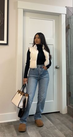 Modest Fashion Winter Outfits, White Vest Outfits For Women Winter, Puffer Vest Skirt Outfit, Winter Outfits With Wide Leg Jeans, Black Jean Fall Outfit, Black Boots And Jeans Outfit, Winter Outfits Vest, Wide Leg Jeans With Boots, Trendy Mom Outfits Winter