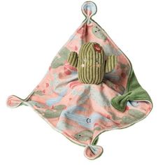 a pink and green blanket with a stuffed cactus on it's back in the shape of a triangle