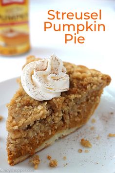 a piece of streusel pumpkin pie on a white plate