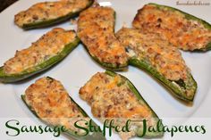 stuffed jalapenos on a white plate with the words sausage stuffed jalapenos