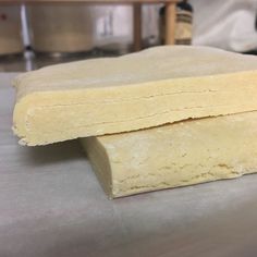 two pieces of food sitting on top of a counter