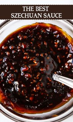 a glass bowl filled with sauce on top of a table