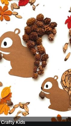 an image of two squirrels surrounded by pine cones and acorns on a white background