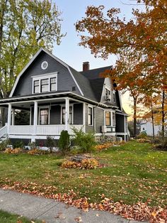 Black windows, white trim, gray siding, exterior paint, Dutch colonial, this old house, Old house, wood siding, Iron Ore Sherwin Williams Bohemian Home Exterior, Charcoal Siding, Brindleton Bay, Dutch People, Pretty Houses