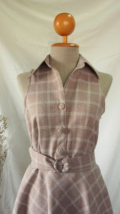 Fitted Plaid Vintage Mini Dress, Fitted Vintage Plaid Mini Dress, Retro Plaid Mini Dress, Vintage Plaid Mini Dress For Summer, Fitted Plaid Retro Vintage Dress, Fitted Retro Plaid Vintage Dress, Fitted Brown Plaid Dress For Spring, Retro Plaid Dresses For Vintage Fashion, Vintage Beige Sleeveless Midi Dress