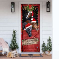 a horse wearing a santa hat standing in front of a christmas door