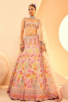 Peach attached cancan lehenga crafted in organza, net with all over boho garden embroidery using Japanese cutdana, sequins and beads highlights. Paired with a matching sweetheart neck embroidered padded blouse and floral vine scallop border dupatta. - Aza Fashions Summer Wedding Lehenga With Intricate Embroidery, Summer Reception Lehenga With Dupatta, Traditional Summer Wedding Lehenga, Summer Reception Lehenga With Pallu, Summer Wedding Lehenga With Zari Work, Summer Wedding Lehenga With Sheer Dupatta, Summer Wedding Lehenga With Dupatta, Summer Wedding Embroidered Choli, Pink Lehenga With Pallu For Summer