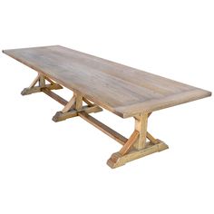 a large wooden table with two legs and a long planked top on an isolated white background