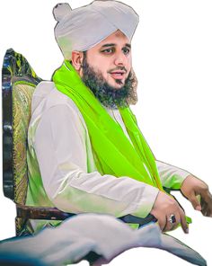 a man sitting in a chair with a green scarf around his neck and wearing a white turban