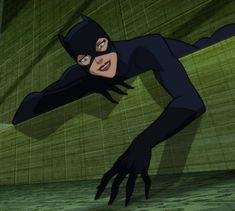 the animated batgirl is flying through the air with her arms outstretched and eyes wide open