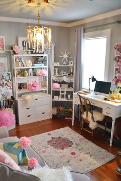 a living room filled with lots of furniture and decor