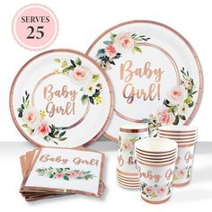 baby girl party supplies including plates, napkins and cups with floral designs on them