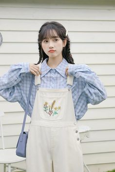 Classic high waisted overalls with a loose boyfriend fit and straight legs. Ditsy wildflower embroidered bib with side pockets and back pockets. Cut open button holes with scissors S: 31.5" waist, 37" hips, 12" rise, 24" thighs, 25" inseamM: 33" waist, 38.5" hips, 12" rise, 25" thighs, 25" inseamL: 34.5" waist, 40" hips, 12" rise, 26" thighs, 25" inseam How to attach buckles:Slide the rectangular buckle on first, followed by the T-shaped buckle. Overall straps will hold on its own as such or you Spring Cotton Overalls With Buttons, Spring Embroidered Cotton Overalls, White Casual Bib Front Overalls, Spring Shortalls With Button Closure, Spring Overalls With Bib Front And Buttons, Spring Overalls With Buttons And Bib Front, Spring Bib Front Overalls With Buttons, Spring Cotton Shortalls With Button Closure, Spring Buttoned Overall Shortalls