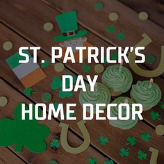 st patrick's day home decor with cupcakes and shamrock decorations on the table