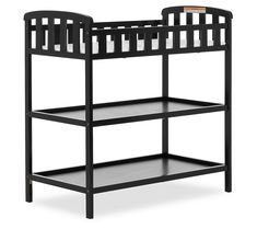 a black baby crib with two shelves on each side